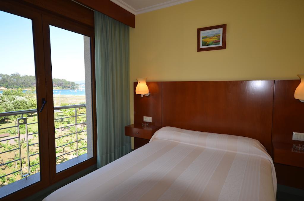 Hotel Maracaibo Portonovo Habitación foto